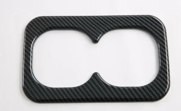 Aplique do Porta-Copos Traseiro Mitsubishi Triton 2024+ Carbono